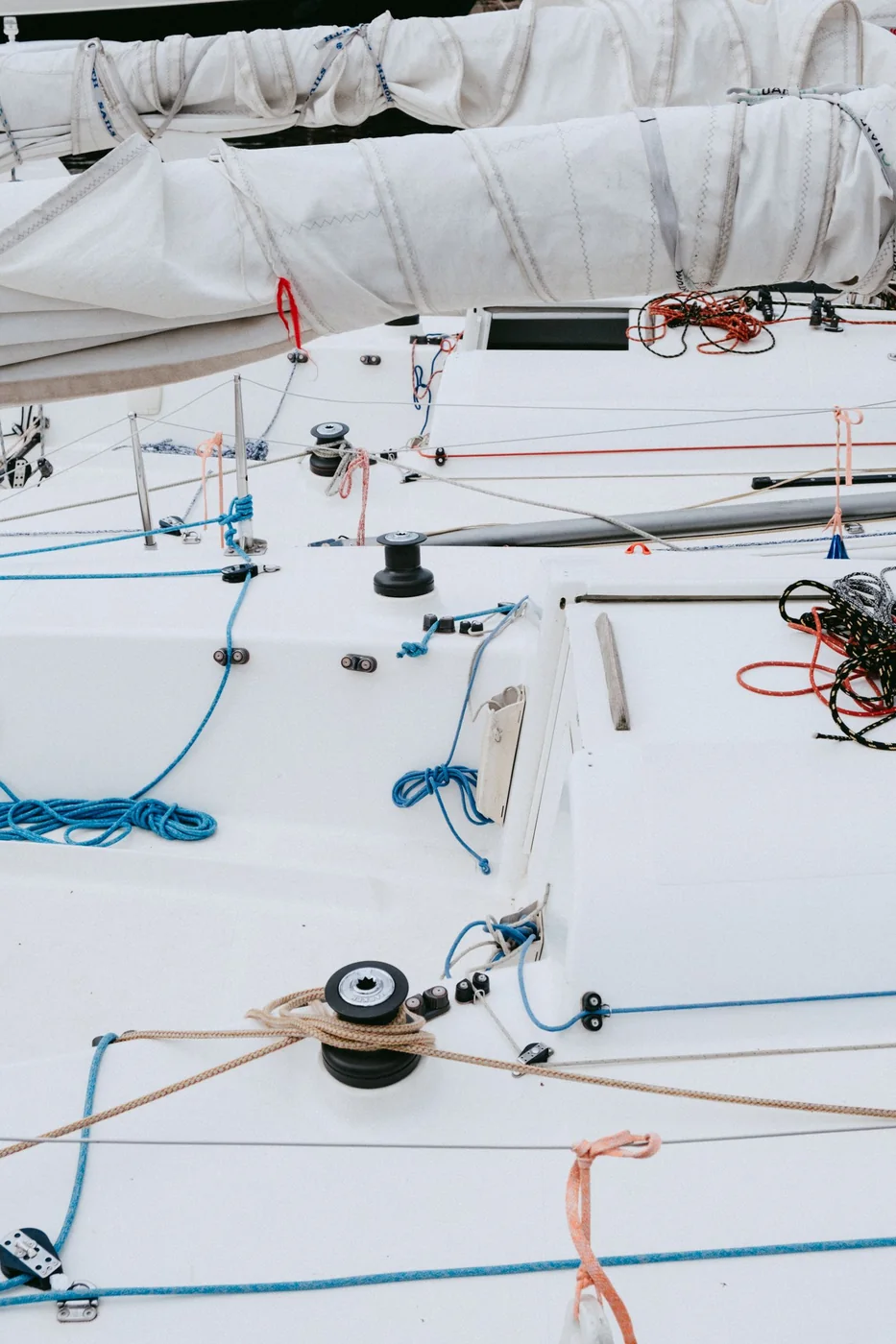 Sailboat deck and rigging at the dock.